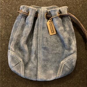 Coach pouch denim blue wristlet with chocolate brown leather accents.